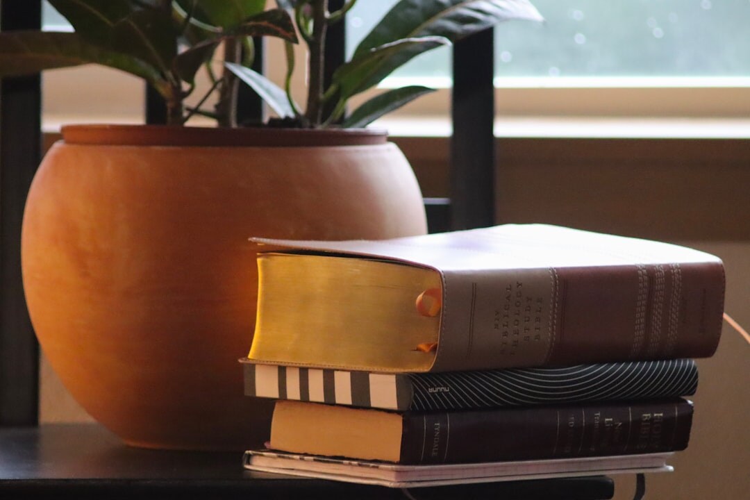 old books stacked on table